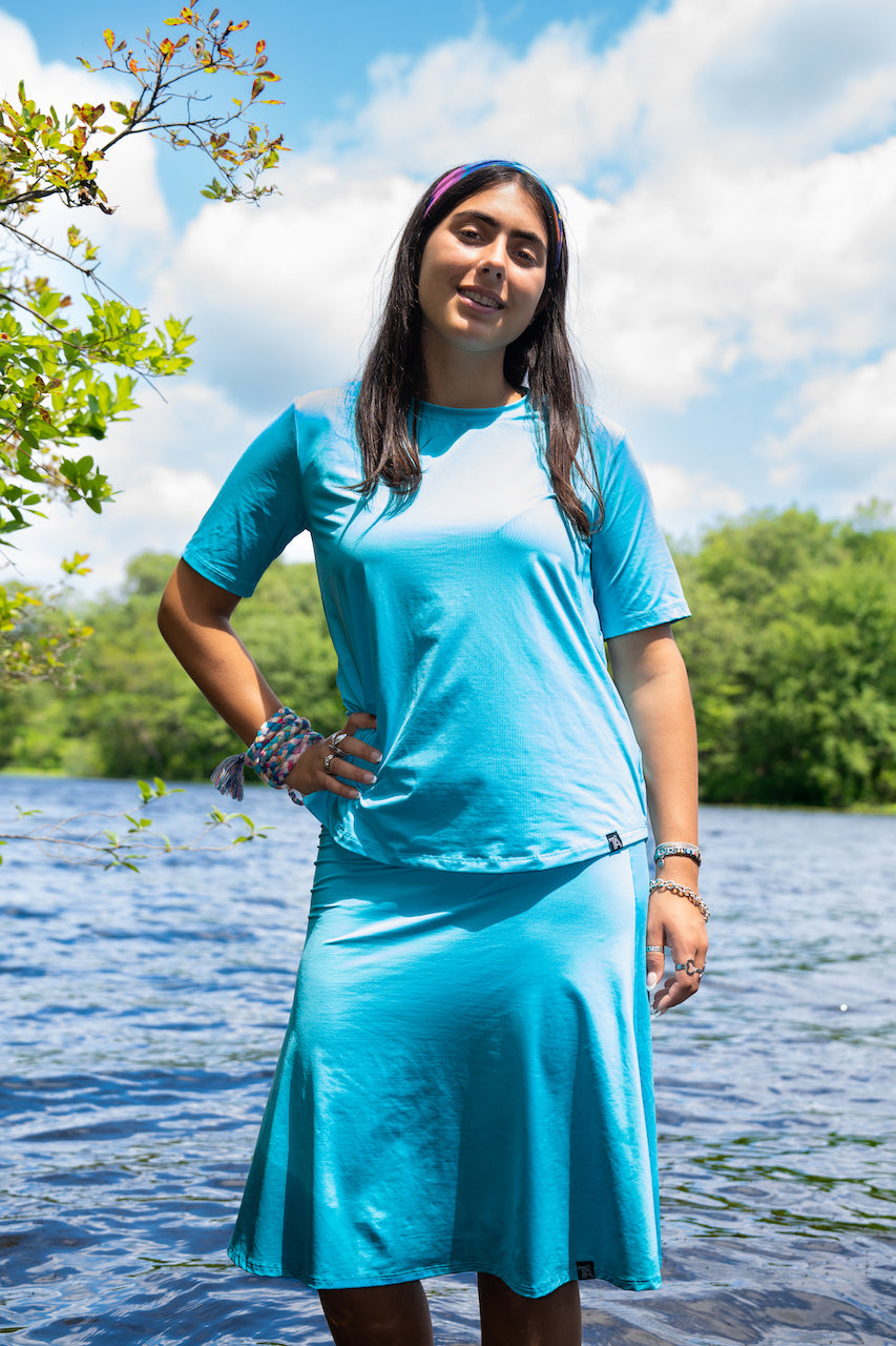 Caribbean Boxy Tee for women – modest, quick-dry activewear top made from recycled materials, perfect for swimming, workouts, and pairing with matching Caribbean Skate Skirt.