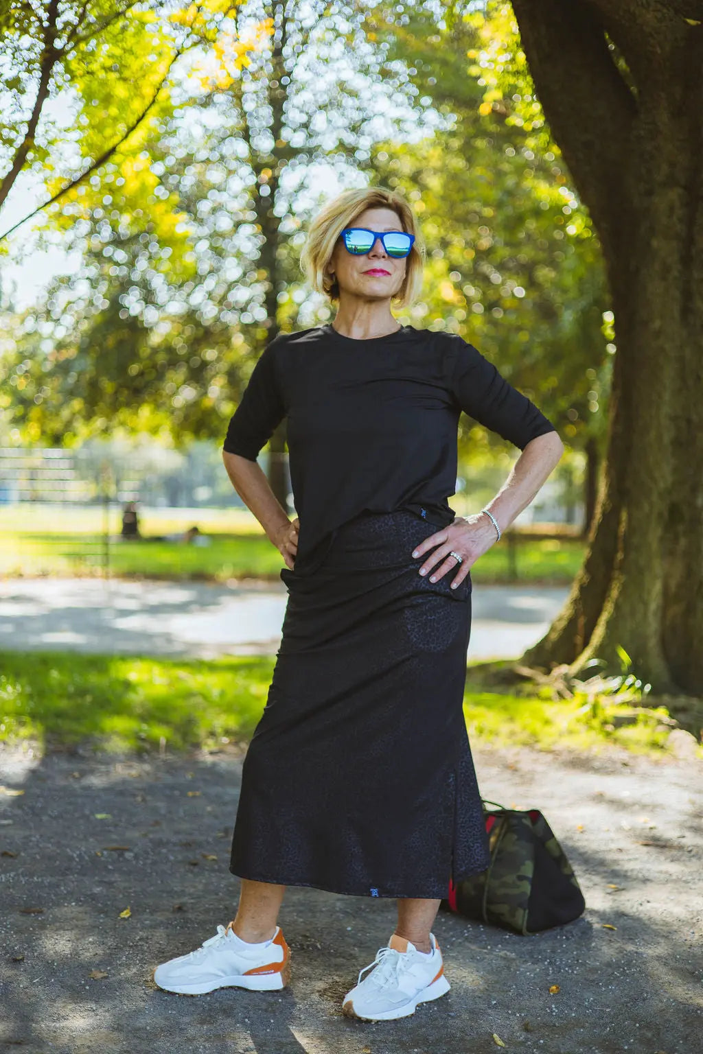 midi athletic skirt in cheetah print with pockets below the knee