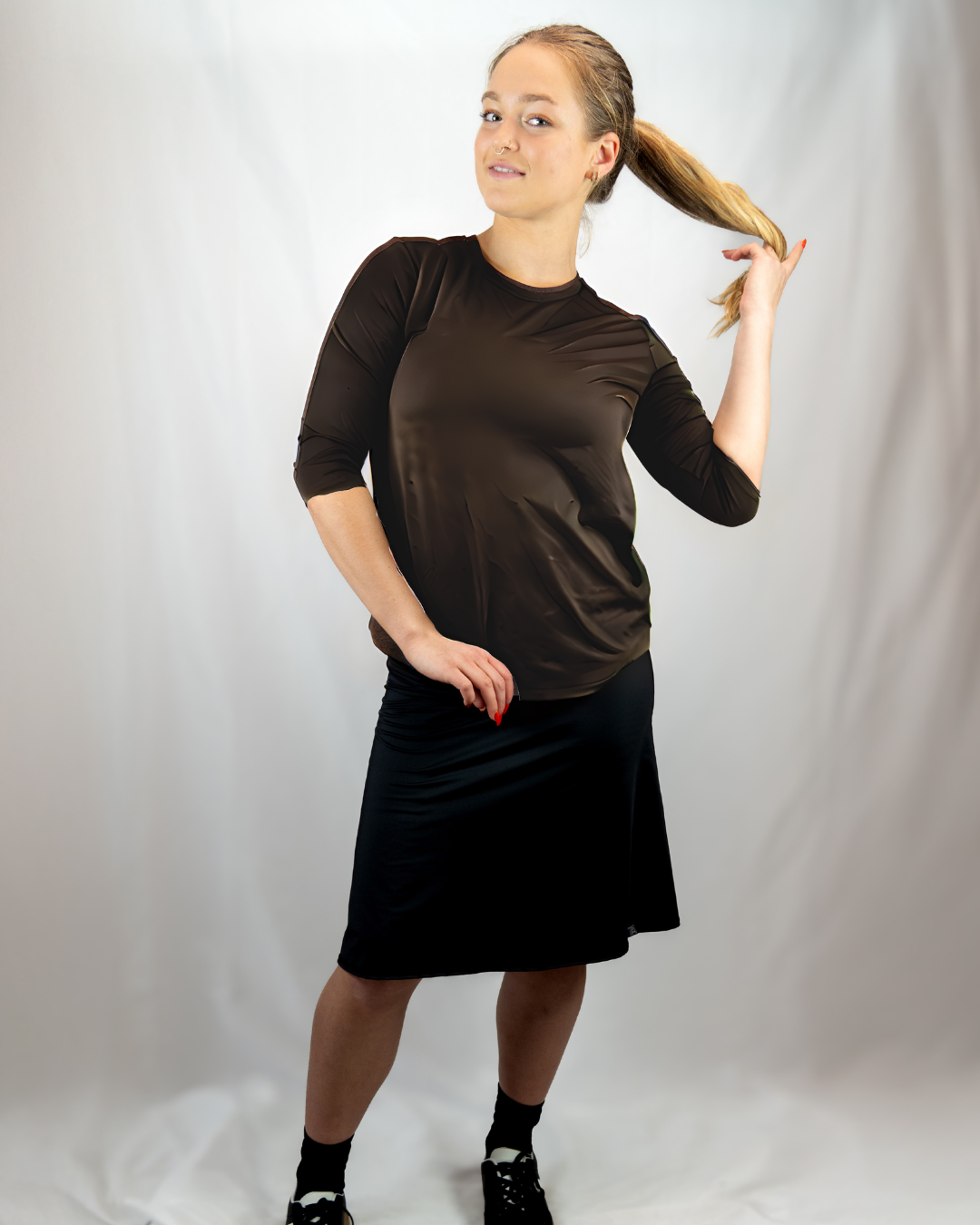 Transcendent Active chocolate brown quarter sleeve performance top — a modest athletic shirt made from sustainable, sweat-wicking fabric for workouts and everyday wear.
