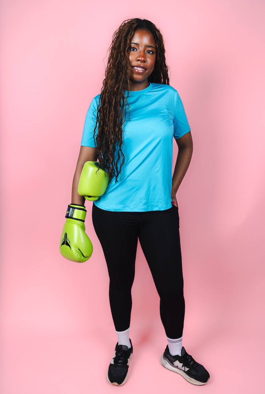 Transcendent Active black 7/8 leggings with side pockets, featuring a sleek, high-rise fit, smooth performance fabric, and a flattering length designed for movement and everyday wear.