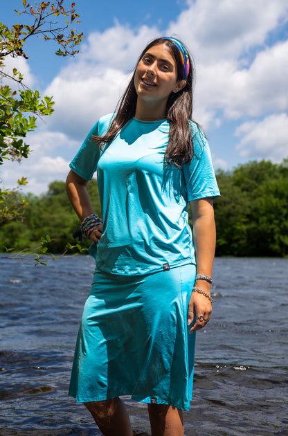 Caribbean Boxy Tee for women – modest, quick-dry activewear top made from recycled materials, perfect for swimming, workouts, and pairing with matching Caribbean Skate Skirt.